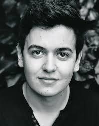 Black and white headshot of Tom Connor