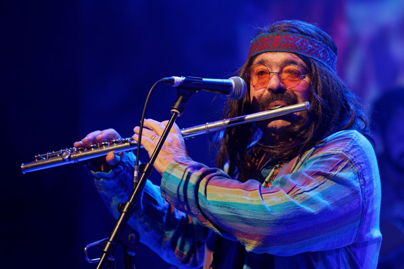 Hippie playing a flute