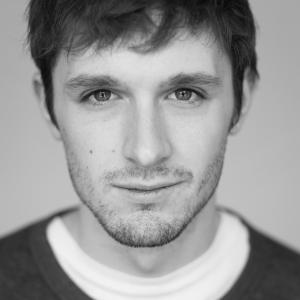 Black and white headshot of Peter Mooney