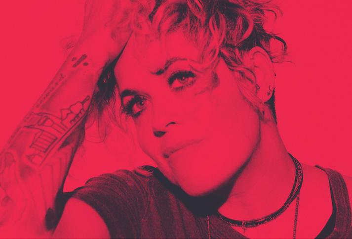 Image of Amy Wadge with pink tint